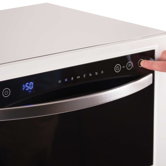 6 Place Setting Compact Countertop Dishwasher in use.