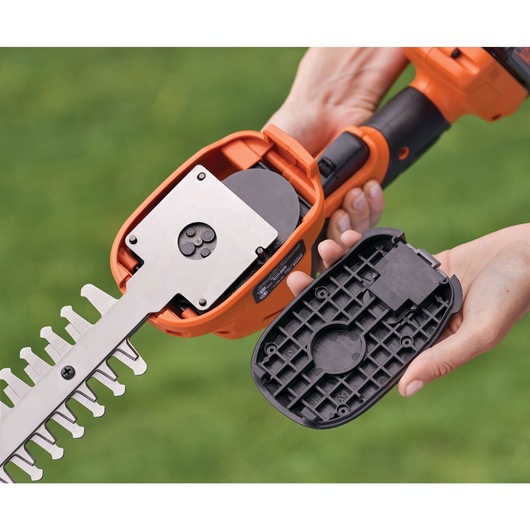20 volt MAX shear shrubber being held by a person.
