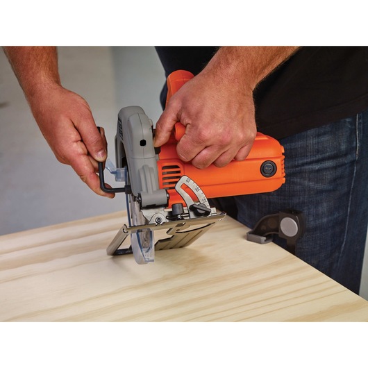 Depth adjust feature of 13 amp circular saw with laser.