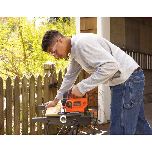 Black and decker jig saw smart select 5 amperes being used.
