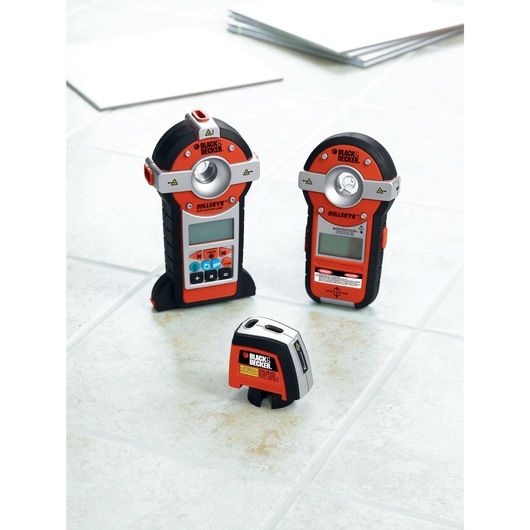 Multiple bullseye auto leveling laser with stud sensor placed next to each other.