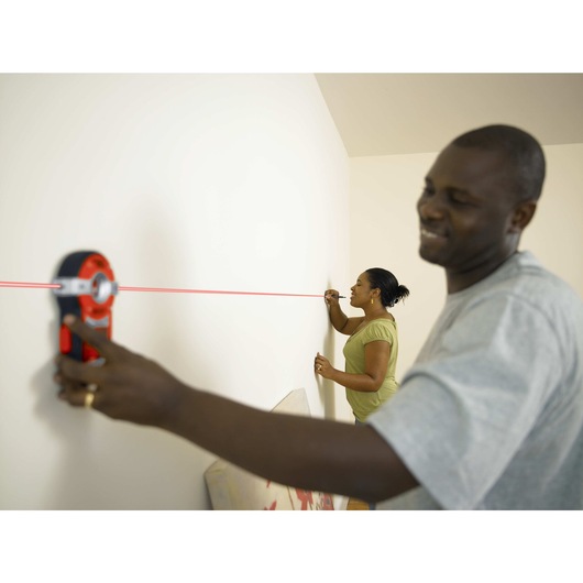 Bullseye auto leveling laser with stud sensor being used.