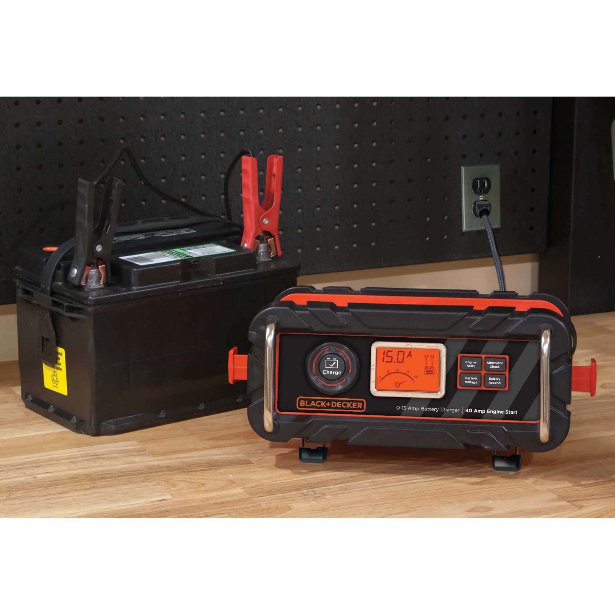 15 Amp portable car battery charger with 40 Amp engine start and alternator check being used to charge a battery.