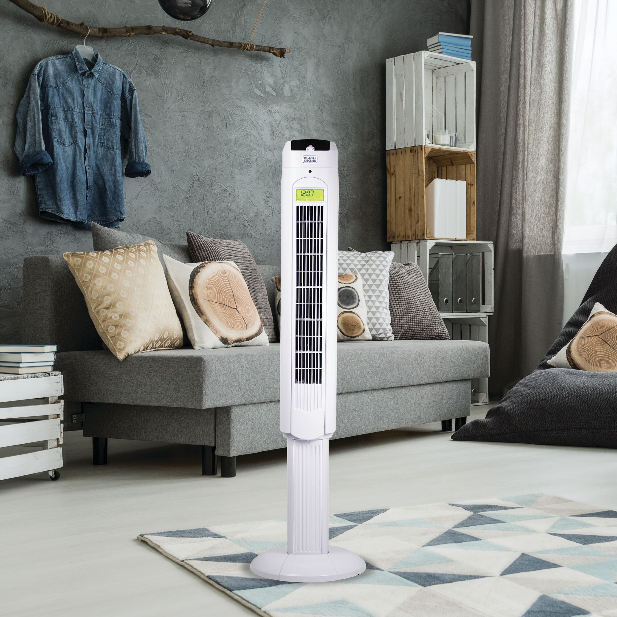 48 Inch Tower Fan with Remote placed on rug in living room.