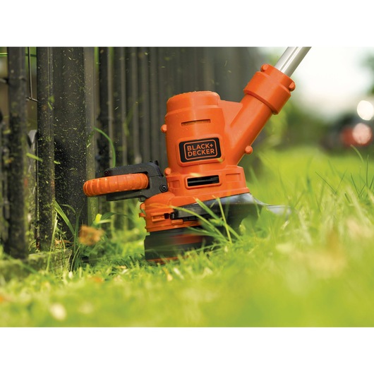 6.5 Ampere 14 inch trimmer edger in action.