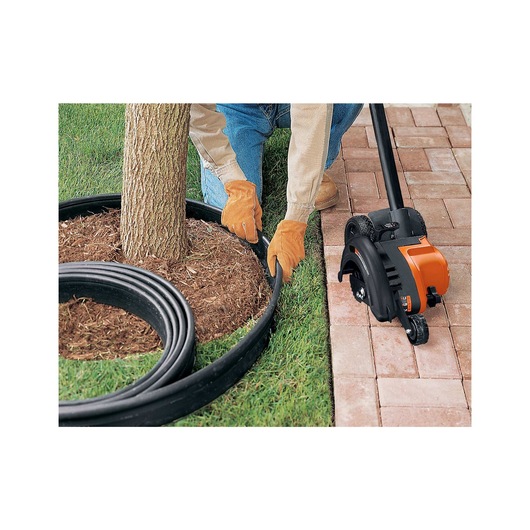 2 in 1 Landscape edger and trencher edging grass.