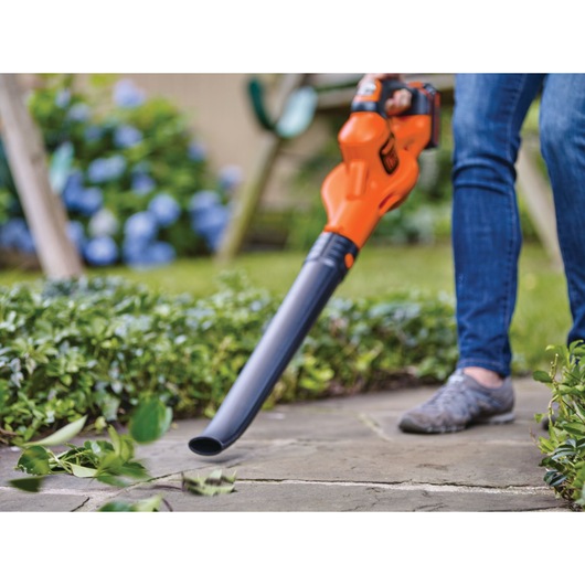 20 volt lithium power booster sweeper being used.
