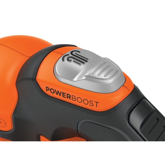 20 volt MAX Lithium POWERBOOST Sweeper being used to clean the floor outside a house by a person.