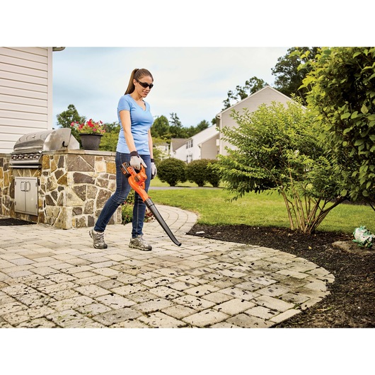 40 volt sweeper being used by a person.