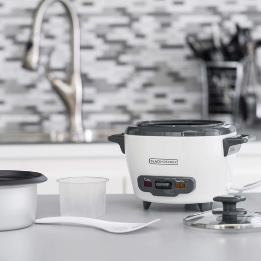 3 cup electric rice cooker with keep warm function white in kitchen.