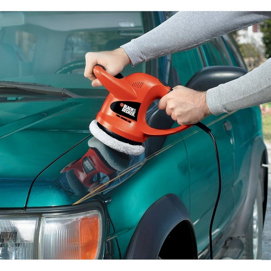 6 inch random orbit waxer polisher being used to polish car.